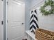 Mud room features a bench with storage, hooks, and decorative wreath at 158 Netherfield Dr, Summerville, SC 29486