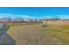 Fenced backyard with a fire pit area and mature grass in a neighborhood at 159 Lucky Day Dr, Summerville, SC 29486