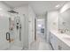 Bright bathroom showcasing glass enclosed shower and view into the main bedroom at 159 Lucky Day Dr, Summerville, SC 29486