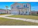 Inviting two-story home with a cozy front porch, perfect for relaxing outdoors at 159 Lucky Day Dr, Summerville, SC 29486