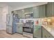Stylish kitchen featuring stainless steel appliances, granite countertops, and white subway tile backsplash at 159 Lucky Day Dr, Summerville, SC 29486
