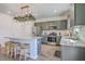 Modern kitchen with granite countertops, stainless steel appliances, and an island with seating at 159 Lucky Day Dr, Summerville, SC 29486
