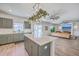 Open floorplan kitchen view into living room featuring a kitchen island with granite countertop at 159 Lucky Day Dr, Summerville, SC 29486