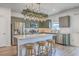 Well-equipped kitchen featuring stainless steel appliances, granite countertops, and an island at 159 Lucky Day Dr, Summerville, SC 29486