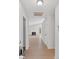 Inviting entryway leading to a spacious living area with hardwood floors and a cozy fireplace at 160 Mickler Dr, Ladson, SC 29456