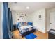 Bright bedroom features colorful soccer-themed bedding, decor, and curtains at 176 Hainsworth Dr, North Charleston, SC 29418