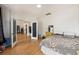 Spacious bedroom with hardwood floors and view into adjoining room at 176 Hainsworth Dr, North Charleston, SC 29418