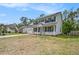 Lovely two-story home with solar panels, a covered front porch, and a well-maintained lawn at 176 Hainsworth Dr, North Charleston, SC 29418