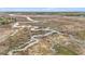 An aerial view reveals an expansive marshland with waterways at 176 Hainsworth Dr, North Charleston, SC 29418