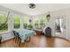 Cozy sun room with many windows and view into the backyard at 176 Hainsworth Dr, North Charleston, SC 29418