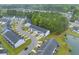 Aerial view of a neighborhood with modern townhouses nestled in a lush green environment at 178 Buchanan Cir, Goose Creek, SC 29445
