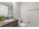 Bathroom featuring a granite countertop, sink, toilet, and shower with neutral color scheme at 178 Buchanan Cir, Goose Creek, SC 29445
