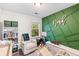 Bright bedroom featuring a reading nook, green accent wall, and kid-friendly décor at 178 Buchanan Cir, Goose Creek, SC 29445