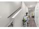 Hallway with a staircase, modern decor, and wood-look flooring leading to the living area at 178 Buchanan Cir, Goose Creek, SC 29445