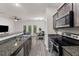 Modern kitchen featuring granite countertops, stainless steel appliances, and an open-concept design at 178 Buchanan Cir, Goose Creek, SC 29445