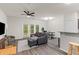 Cozy living room with a plush sofa, stylish decor, and lots of natural light at 178 Buchanan Cir, Goose Creek, SC 29445