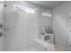 Modern walk-in shower with clear glass doors, a bench, and chrome fixtures at 183 Country Gate Lane Ln, Summerville, SC 29485
