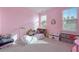 Adorable pink bedroom with a canopy bed, perfect for a  at 183 Country Gate Lane Ln, Summerville, SC 29485