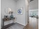 Bright entryway showcasing wood floors, a console table with decor, and an open view into the living area at 183 Country Gate Lane Ln, Summerville, SC 29485