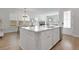 Kitchen island offers a sink, stainless steel dishwasher, and ample storage space at 183 Country Gate Lane Ln, Summerville, SC 29485