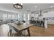 Spacious open-concept living area with a dining table, a modern kitchen, and a comfortable seating area at 183 Country Gate Lane Ln, Summerville, SC 29485