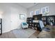 Cozy office space with built-in bookshelves, a comfortable chair, and natural light from multiple windows at 183 Country Gate Lane Ln, Summerville, SC 29485