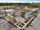 Aerial view of the town center featuring colorful buildings with outdoor seating, landscaped walking paths and ample parking at 183 Country Gate Lane Ln, Summerville, SC 29485