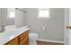 Bathroom with vanity, toilet, and windows for natural light at 1833 Hubbell Dr, Mount Pleasant, SC 29466