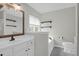 Bathroom boasts a vanity, soaking tub, and open shelving at 1833 Hubbell Dr, Mount Pleasant, SC 29466