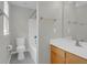 Clean bathroom with tile floors, a shower-tub combo, and a wood vanity at 1833 Hubbell Dr, Mount Pleasant, SC 29466