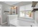 Bright bathroom features a soaking tub and open shelving at 1833 Hubbell Dr, Mount Pleasant, SC 29466