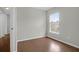Comfortable bedroom with a window and hardwood floors at 1833 Hubbell Dr, Mount Pleasant, SC 29466