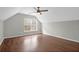 Bedroom featuring a vaulted ceiling, hardwood floors, and a fan at 1833 Hubbell Dr, Mount Pleasant, SC 29466