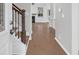 View of an entryway boasting gleaming hardwood floors leading into a bright and airy living space at 1833 Hubbell Dr, Mount Pleasant, SC 29466