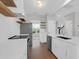 Bright open-concept kitchen with stainless appliances and hardwood flooring at 1833 Hubbell Dr, Mount Pleasant, SC 29466