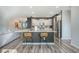 Modern kitchen features a large island with seating and stainless steel appliances at 185 Red Bluff St, Summerville, SC 29483