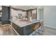 Modern kitchen featuring white cabinets, stainless steel appliances, and a large island at 185 Red Bluff St, Summerville, SC 29483