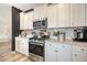 Bright kitchen features white cabinets, stainless steel appliances, and modern fixtures at 185 Red Bluff St, Summerville, SC 29483
