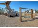 Fun playground features wooden airplane structure and swings, providing an engaging space for children to play at 185 Red Bluff St, Summerville, SC 29483