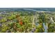 Aerial view of the property's location, nearby trees, water, and the surrounding community at 1883 Hall Point Rd, Mount Pleasant, SC 29466