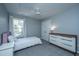 Cozy bedroom with large window, closet, and modern dresser, creating a comfortable retreat at 1883 Hall Point Rd, Mount Pleasant, SC 29466