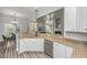 Spacious kitchen featuring granite countertops, stainless steel appliances, and a breakfast bar at 1883 Hall Point Rd, Mount Pleasant, SC 29466