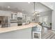 Spacious kitchen featuring granite countertops, a breakfast bar, and stainless steel appliances at 1883 Hall Point Rd, Mount Pleasant, SC 29466