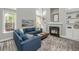 Cozy living room with a fireplace, built-in shelving, and comfortable seating around a coffee table at 1883 Hall Point Rd, Mount Pleasant, SC 29466