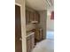 Kitchen includes wood cabinets and laminate countertops at 201 Greenmeadow Dr, Goose Creek, SC 29445