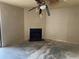Living room features a fireplace with a black surround and fan at 201 Greenmeadow Dr, Goose Creek, SC 29445