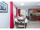 Dining room features a round table with seating for four and stainless-steel refrigerator at 201 Island Green Rd, Goose Creek, SC 29445
