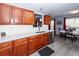 Kitchen features stainless steel appliances, white subway tile backsplash, and wood cabinets at 201 Island Green Rd, Goose Creek, SC 29445