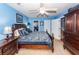 This main bedroom features a ceiling fan, carpet floors, and wood furniture at 201 Island Green Rd, Goose Creek, SC 29445
