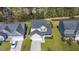 Aerial view of a two-story house with well-maintained landscaping, a driveway, and a spacious backyard at 206 Alpine Rd, Summerville, SC 29485